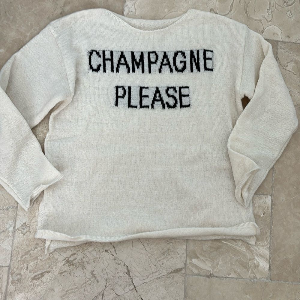 Champagne Please knit sweater! brand new, white with black letters.